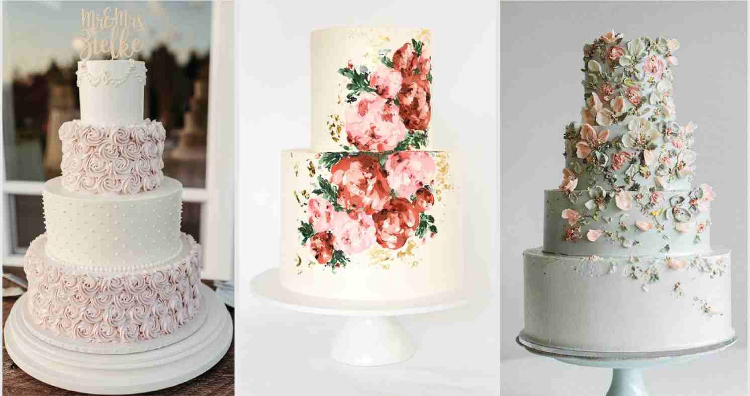Elegant white wedding cake with delicate floral decorations on a table